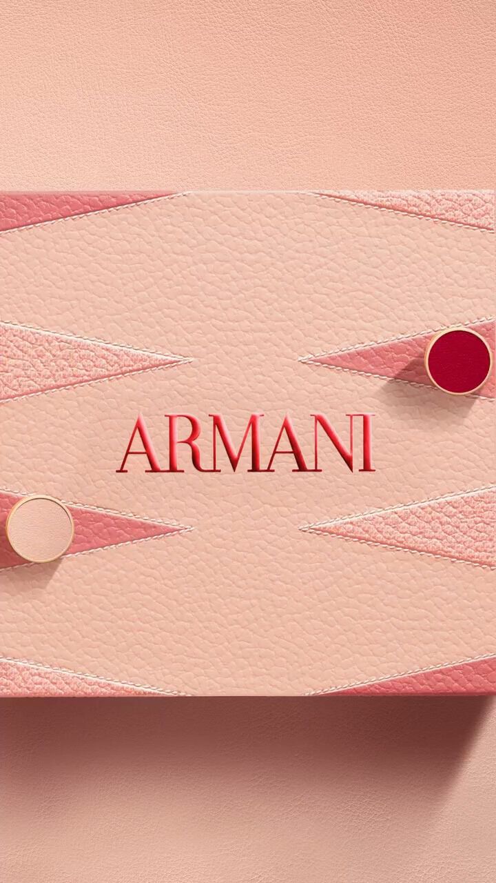 This video showcases Armani Beauty's holiday season collection. It features models at a party, showcasing various makeup products and fragrances. The overall atmosphere is festive and glamorous, with a focus on shimmering lights and elegant attire. The video highlights products such as lipstick, eyeshadow, and perfumes like "Si" and "Stronger With You."