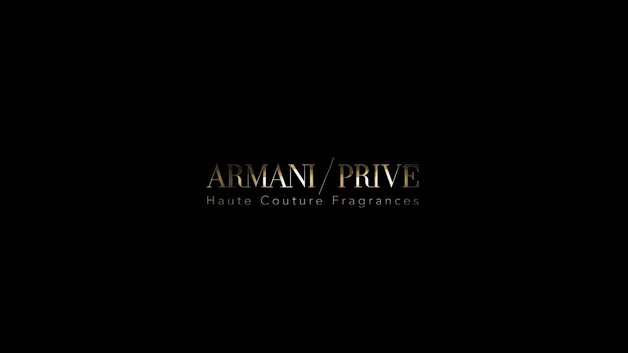 Black background with the text "ARMANI/PRIVE Haute Couture Fragrances" in elegant gold lettering.