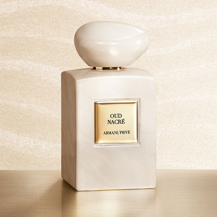 Frasco de perfume Armani Prive Oud Nacre con vial de muestra.