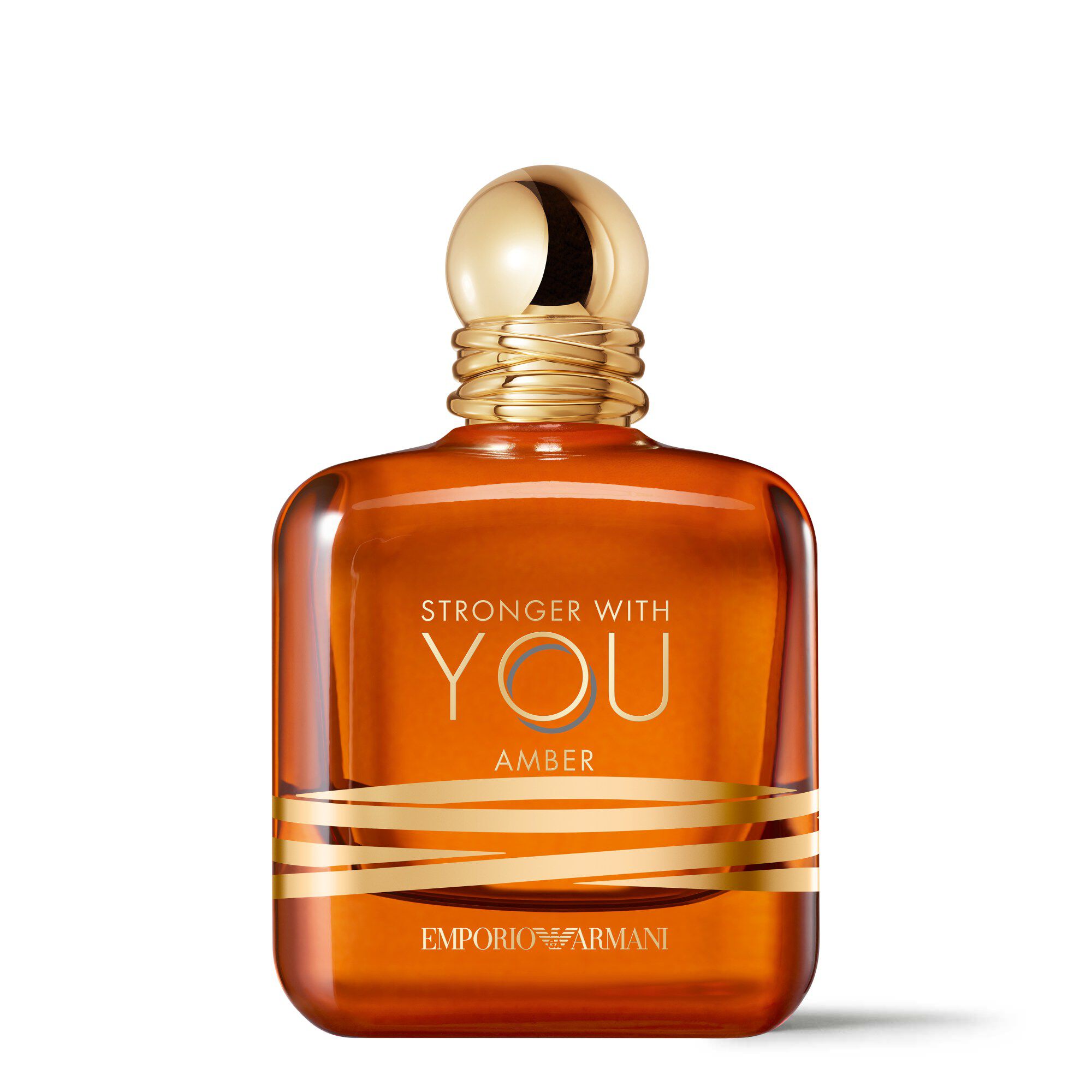 Frasco de perfume Emporio Armani Stronger With You Amber con tapa dorada sobre fondo blanco