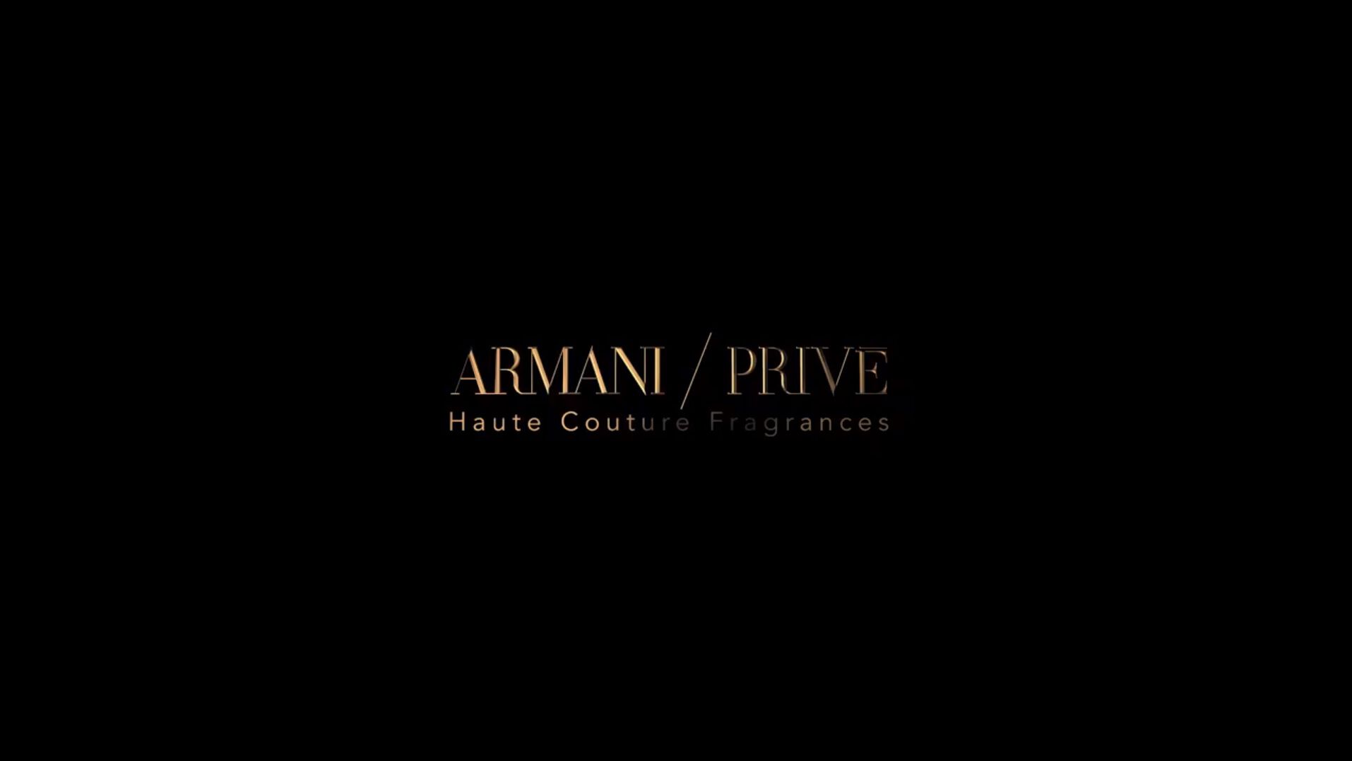 Logotipo de Armani Privé, fragancias de alta costura, sobre fondo negro elegante y sofisticado.
