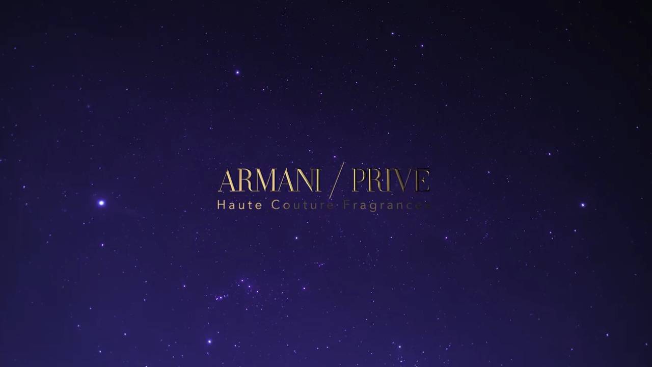 Fondo estrellado con el logo de Armani Privé y el texto 'Haute Couture Fragrance' en elegante tipografía.